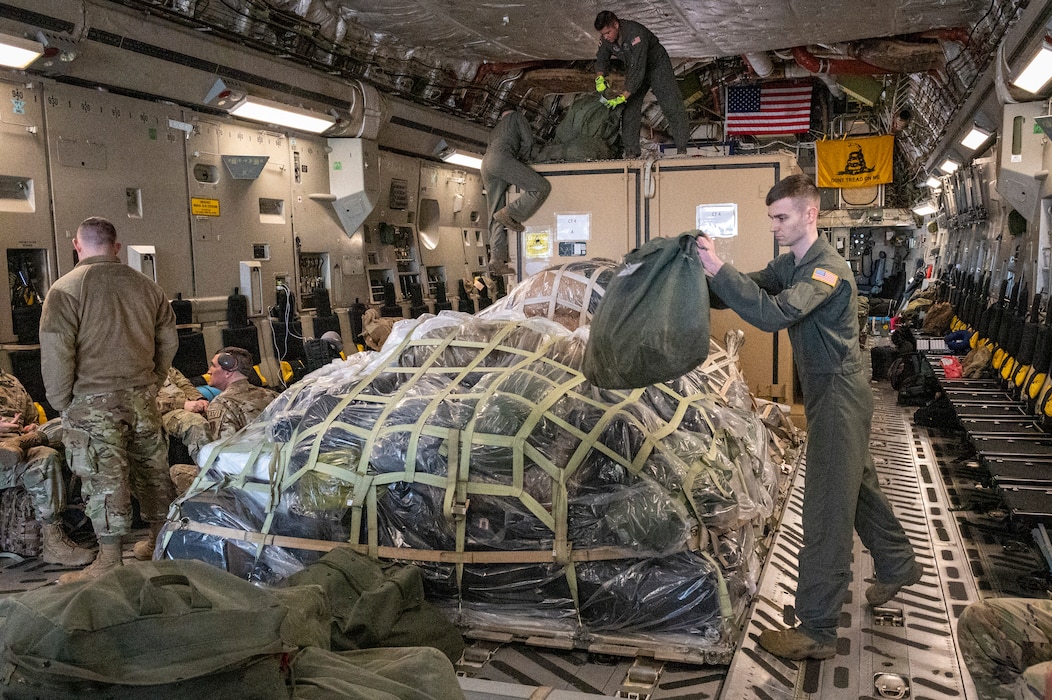 U.S. Air Force Airmen with the 167th Airlift Wing, West Virginia National Guard, prepare to offload cargo and personnel at Wunstorf Air Base, Germany, May 30, 2023 as part of exercise Air Defender 2023.