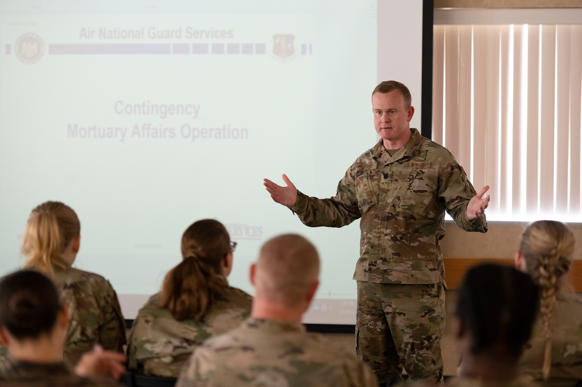 U.S. Air Force Chaplain (Lt. Col.) Nathan Yost, 167th Airlift Wing, talks during a mortuary affairs course as part of a training event at the 167th Airlift Wing, Martinsburg, West Virginia, June 9, 2023.