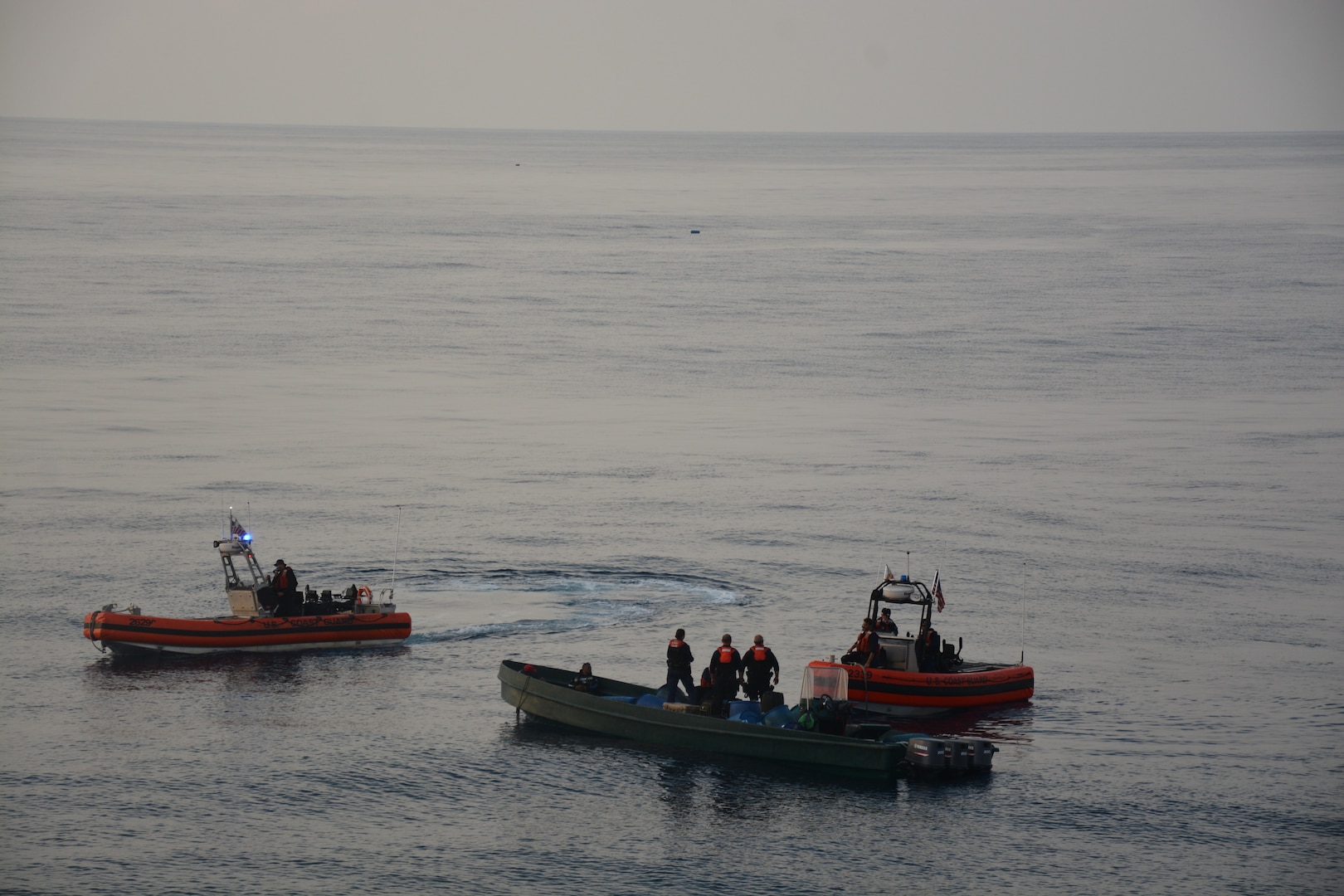 Coast Guard Cutter Alert (WMEC 630) gains positive control of a suspected drug smuggling vessel in the Eastern Pacific Ocean May 26, 2023. A boarding team interdicted more than 2,600 kilograms of cocaine. (U.S. Coast Guard photo)