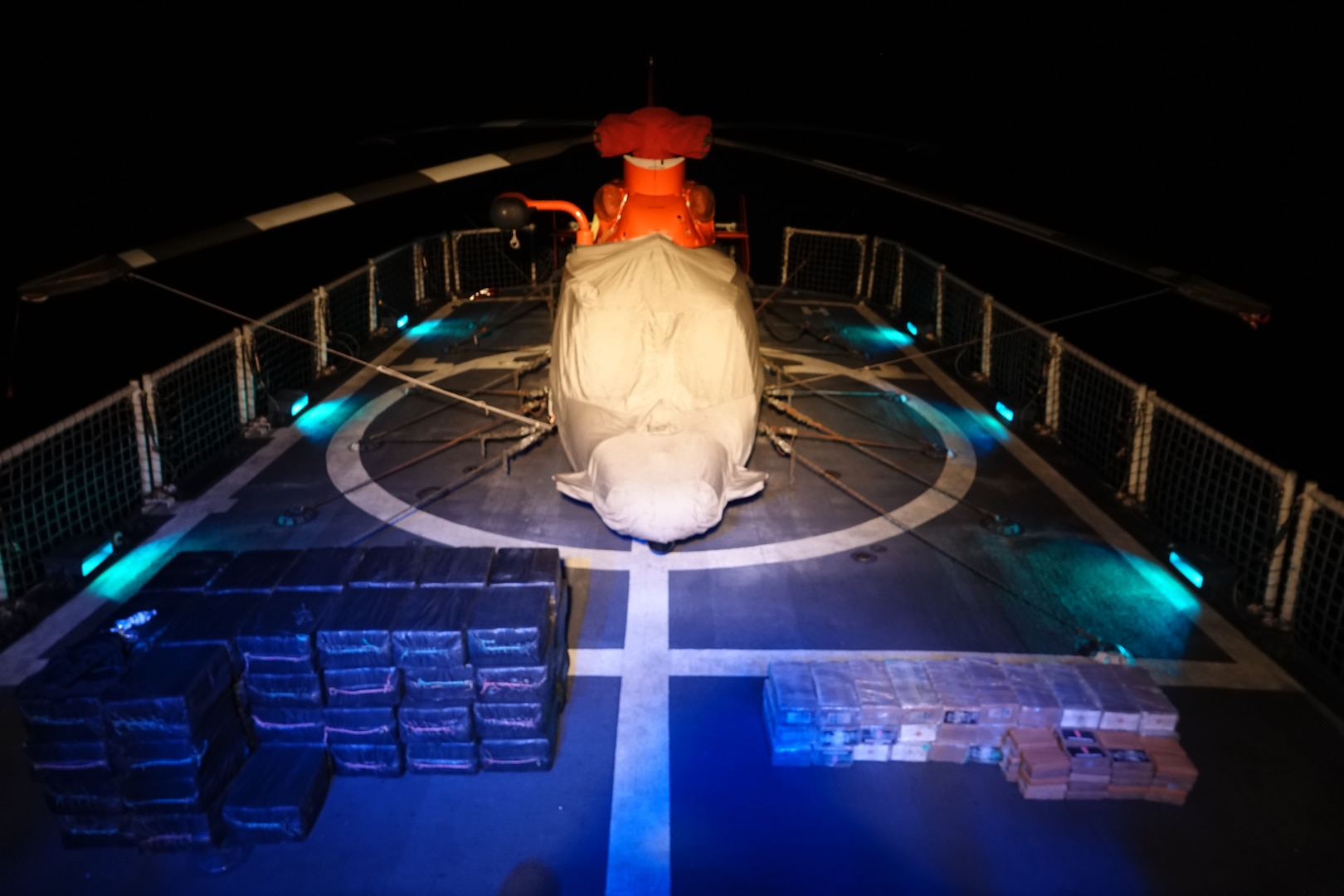 Approximately 2,600 kilograms cocaine are displayed on the deck of the Coast Guard Cutter Alert (WMEC 630) while underway in the Eastern Pacific Ocean May 26, 2023. The Coast Guard employs Helicopter Interdiction Tactical Squadron MH-65 Dolphin helicopters and aircrews to locate and stop non-compliant suspected drug smuggling vessels. (U.S. Coast Guard photo by Petty Officer 2nd Class Hannah Peterman)