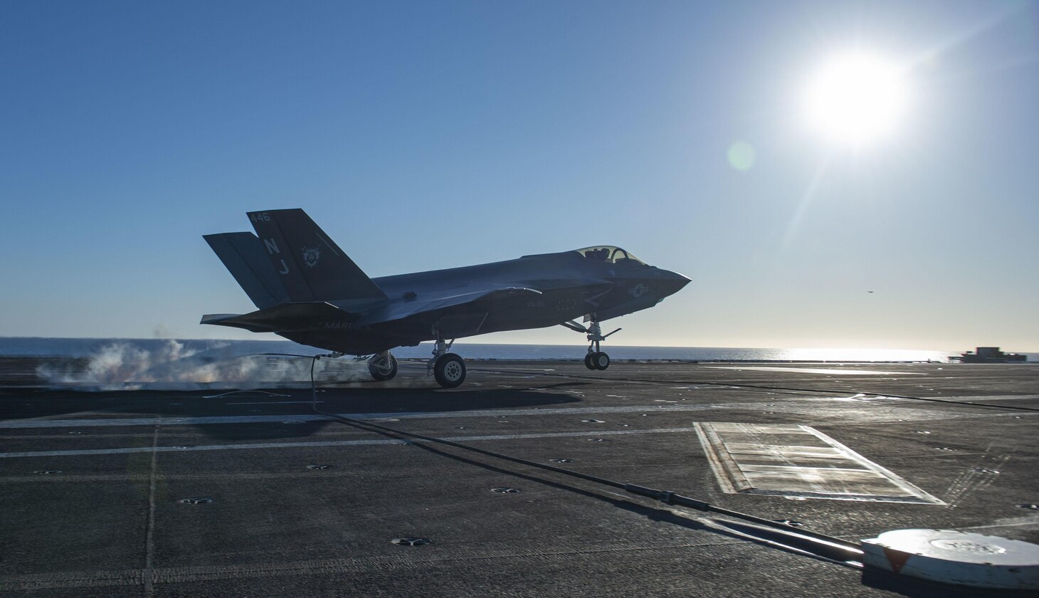 An F-35C Lightning II, from the "Rough Raiders" of Strike Fighter Squadron (VFA) 125, makes an arrested gear landing on the flight deck of the aircraft carrier USS Nimitz (CVN 68). Nimitz is underway preparing for future operations.