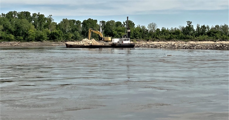 The U.S. Army Corps of Engineers (USACE) Memphis District maintains a safe and dependable navigation channel for 355 miles of the Mississippi River. It delivers on this charge by constructing dikes and other river training structures, performing revetment and dredging operations, and executing several other navigation and flood risk management projects. 
                                                                                     
The Memphis District completes dozens of projects annually to ensure a safe and reliable waterway, most recently partnering with Commercial Towing Interests, represented by the Lower Mississippi River Committee (LOMRC), to carry out a dike construction and restoration project in New Madrid, Missouri.