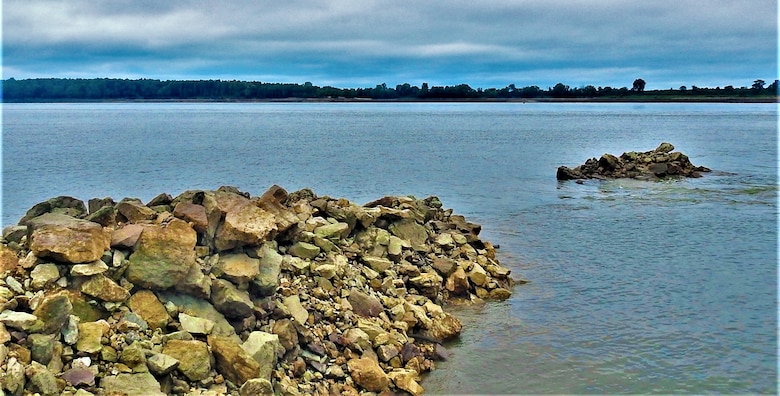The U.S. Army Corps of Engineers (USACE) Memphis District maintains a safe and dependable navigation channel for 355 miles of the Mississippi River. It delivers on this charge by constructing dikes and other river training structures, performing revetment and dredging operations, and executing several other navigation and flood risk management projects. 
                                                                                     
The Memphis District completes dozens of projects annually to ensure a safe and reliable waterway, most recently partnering with Commercial Towing Interests, represented by the Lower Mississippi River Committee (LOMRC), to carry out a dike construction and restoration project in New Madrid, Missouri.