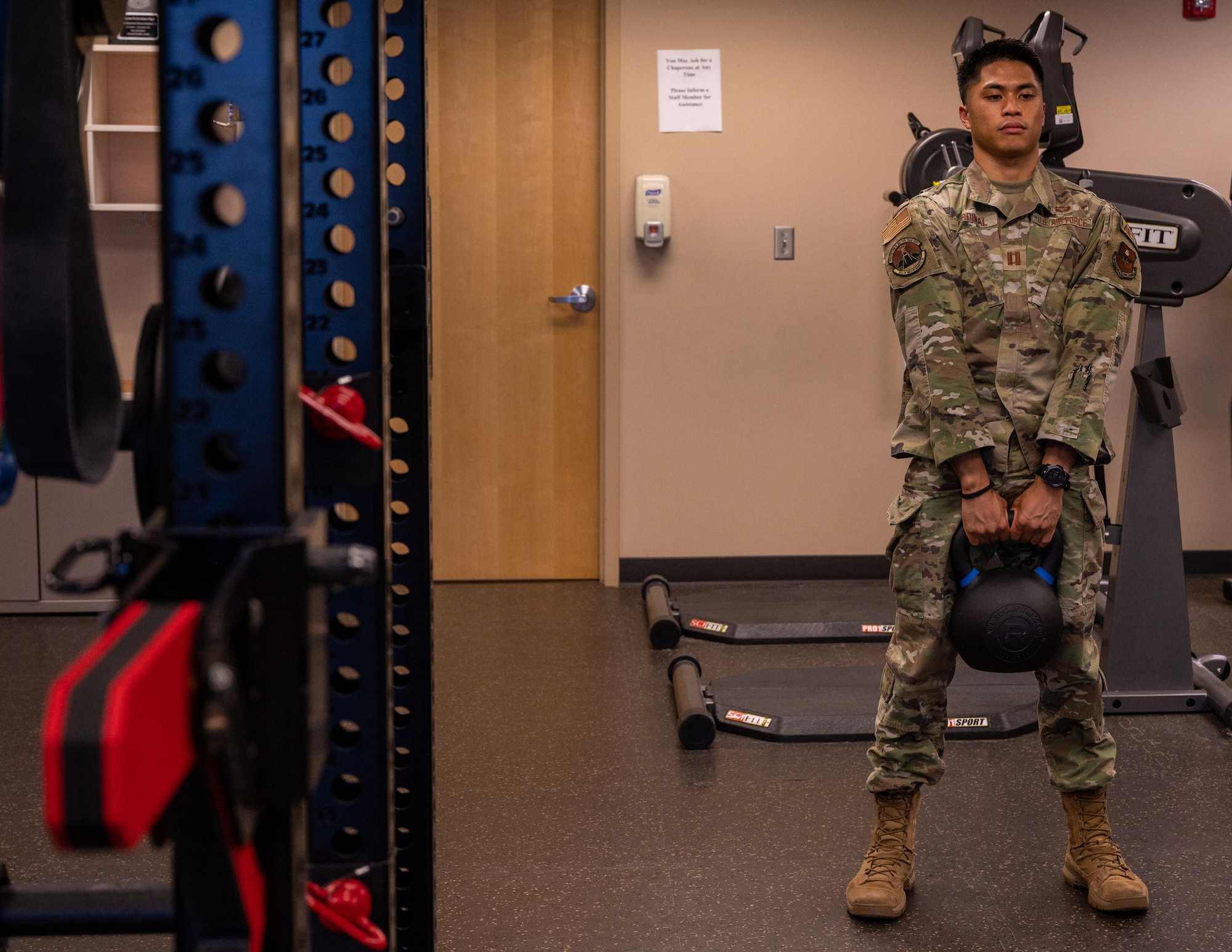 U.S. Air Force Capt. Xavier Cardinal, 56th Medical Group staff physical therapist, shows proper deadlifting form, June 15, 2023, at Luke Air Force Base, Arizona.
