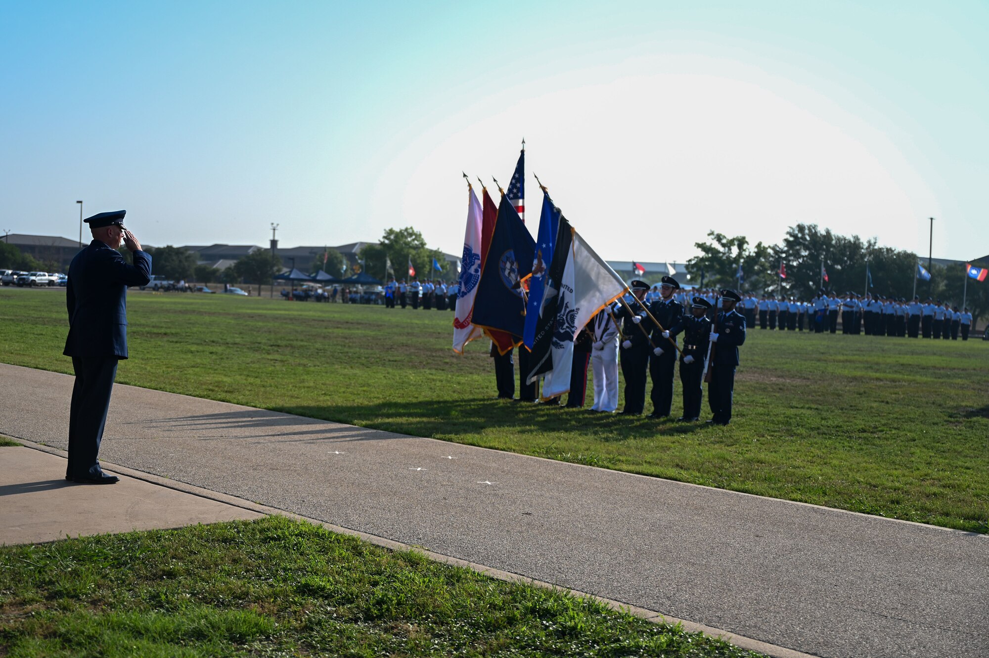 Members of the 17th Training Wing present a final salute to U.S. Air Force Col. Matthew Reilman, outgoing 17th TRW commander, during the change of command ceremony at Goodfellow Air Force Base, Texas, June 16, 2023. The final salute represents a “thank you” to the outgoing commander for their leadership. (U.S. Air Force photo by Senior Airman Sarah Williams)