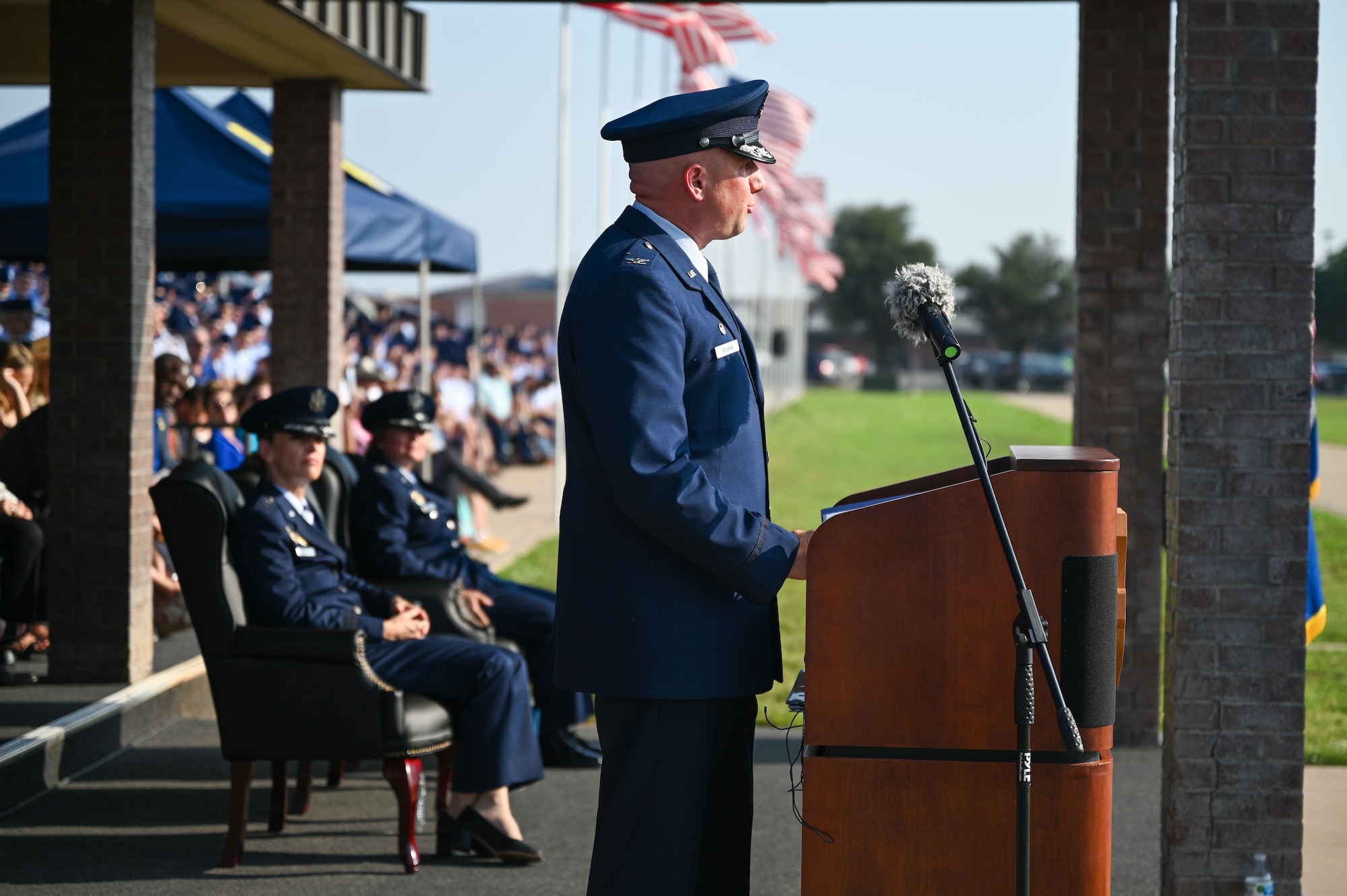 U.S. Air Force Col. Matthew Reilman, 17th Training Wing outgoing commander, speaks during the 17th TRW change of command ceremony at Goodfellow Air Force Base, Texas, June 16, 2023. The change of command ceremony is a military tradition, which illustrates the formal transfer of authority by the passing of the guidon from departing commander to incoming commander. (U.S. Air Force photo by Senior Airman Sarah Williams)