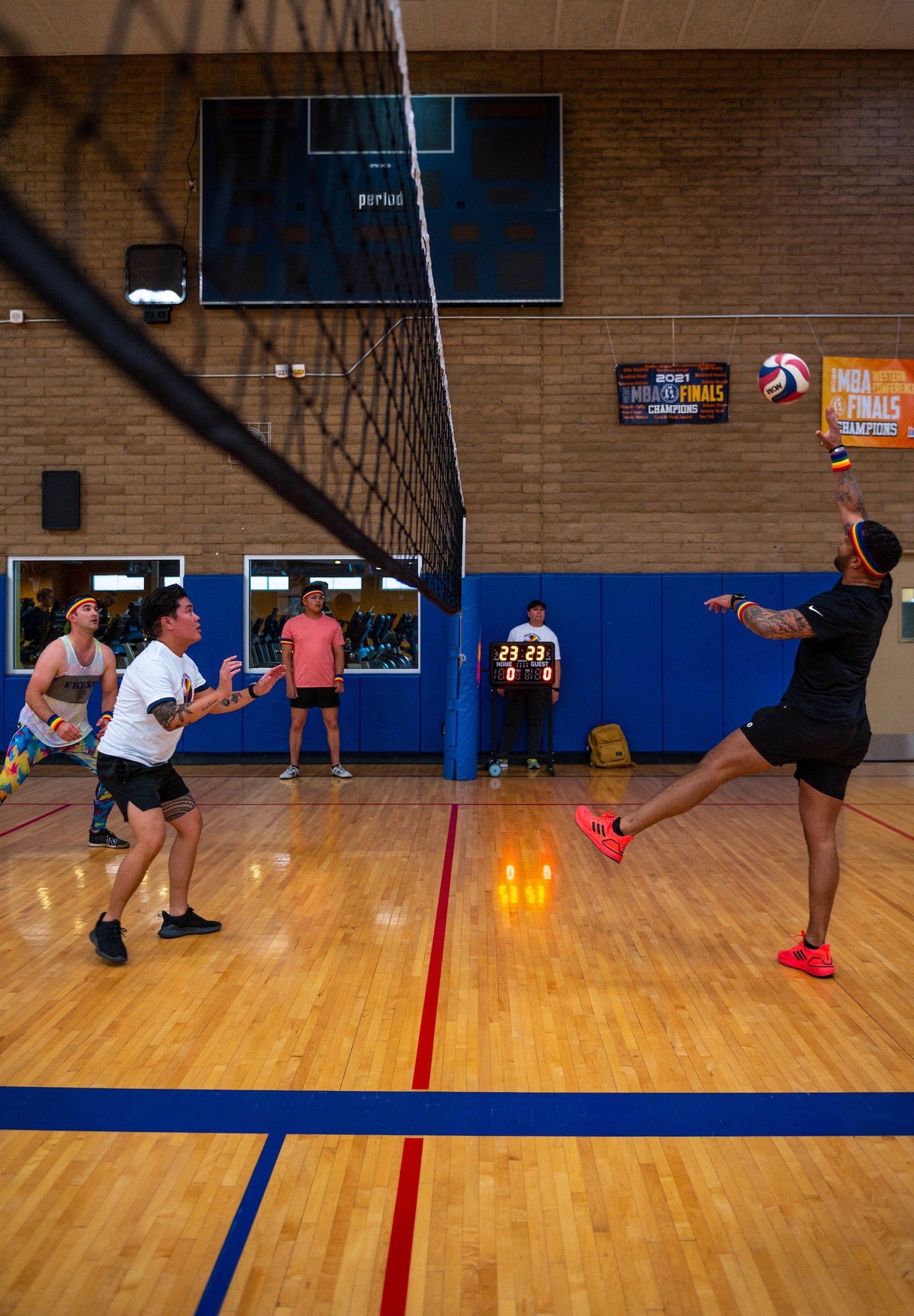 U.S. Air Force Airmen assigned to the 56th Fighter Wing participate in in a volleyball tournament in observance of Pride Month, June 15, 2023, at Luke Air Force Base, Arizona.