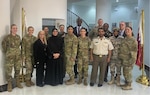 West Virginia National Guardsmen Tech. Sgt. Victoria Bagley, Maj. Taylar Belfield, left, and 1st Lt. Abbey Welborn fourth from right, participated in the Women in Strategic Intelligence Seminar  at the Directorate of Military Intelligence in Doha, Qatar, May 14-18