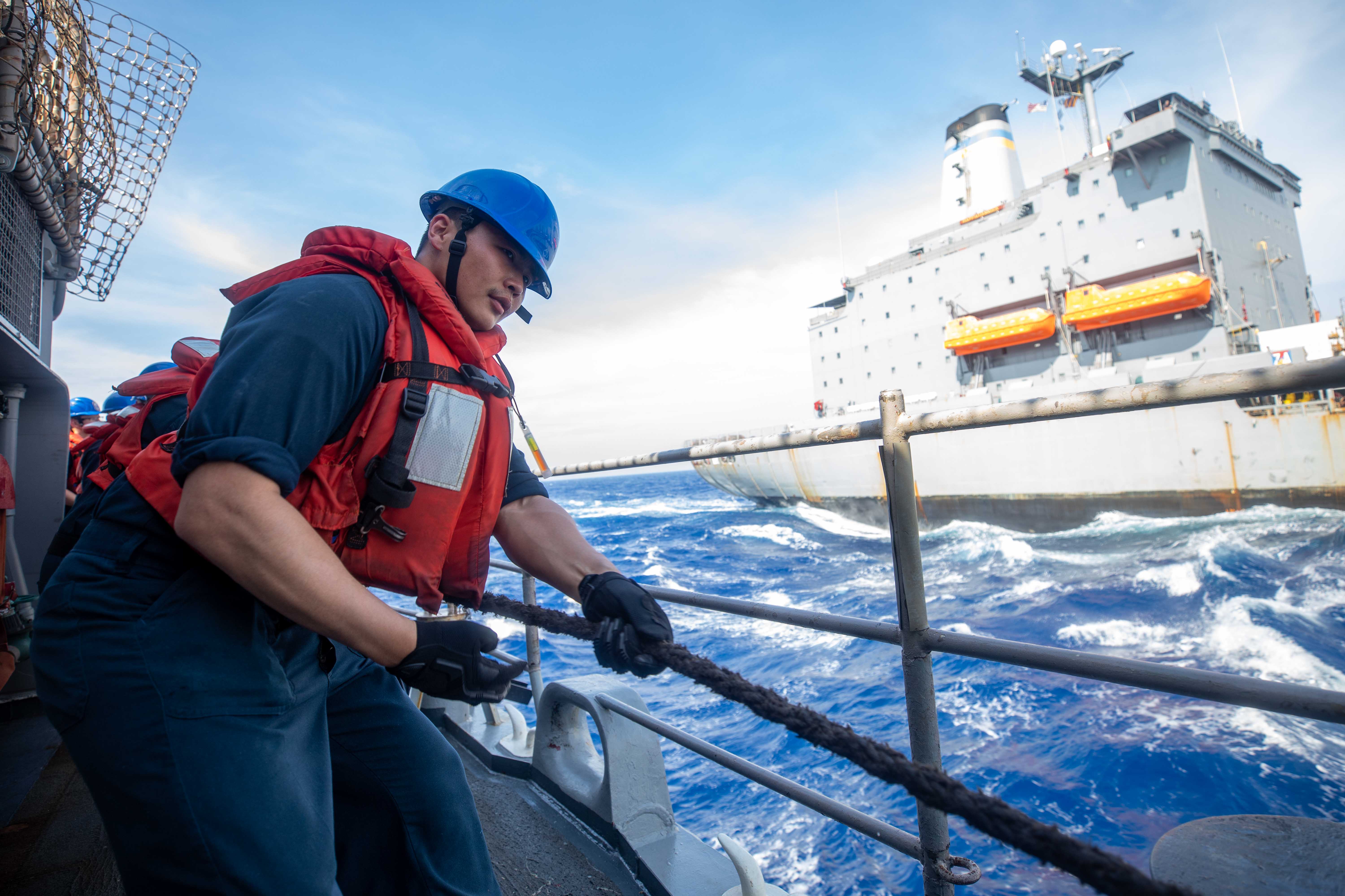 USS Antietam (CG 54) replenishes from USNS Rappahannock (T-AO 204) in the Philippine Sea.