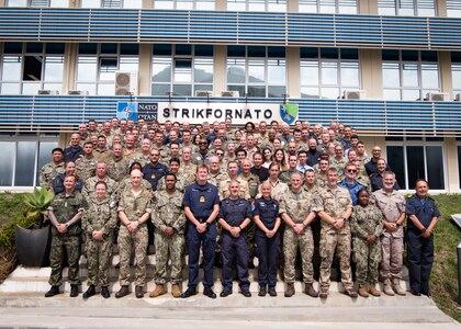 The exercise Baltic Operations 2023 (BALTOPS 23) exercise control group stands outside the Naval Striking and Support Forces NATO Headquarters June 12, 2023. BALTOPS 23 is the premier maritime-focused exercise in the Baltic Region. The exercise, led by U.S. Naval Forces Europe-Africa and executed by Naval Striking and Support Forces NATO provides a unique training opportunity to strengthen the combined response capability critical to preserving the freedom of navigation and security in the Baltic Sea. (U.S. Navy Photo by Mass Communication Specialist 1st Class Cameron C. Edy)