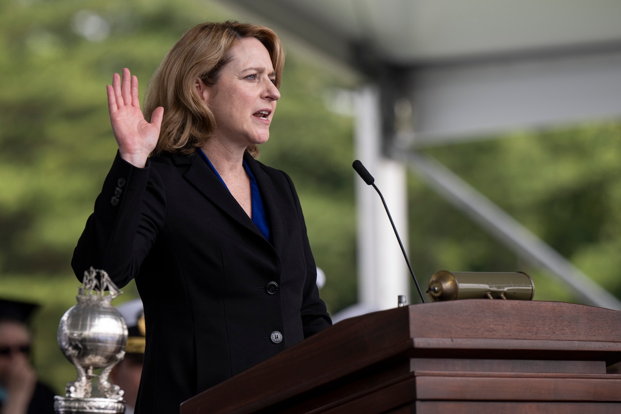 Deputy Secretary of Defense Kathleen Hicks raises her right hand.