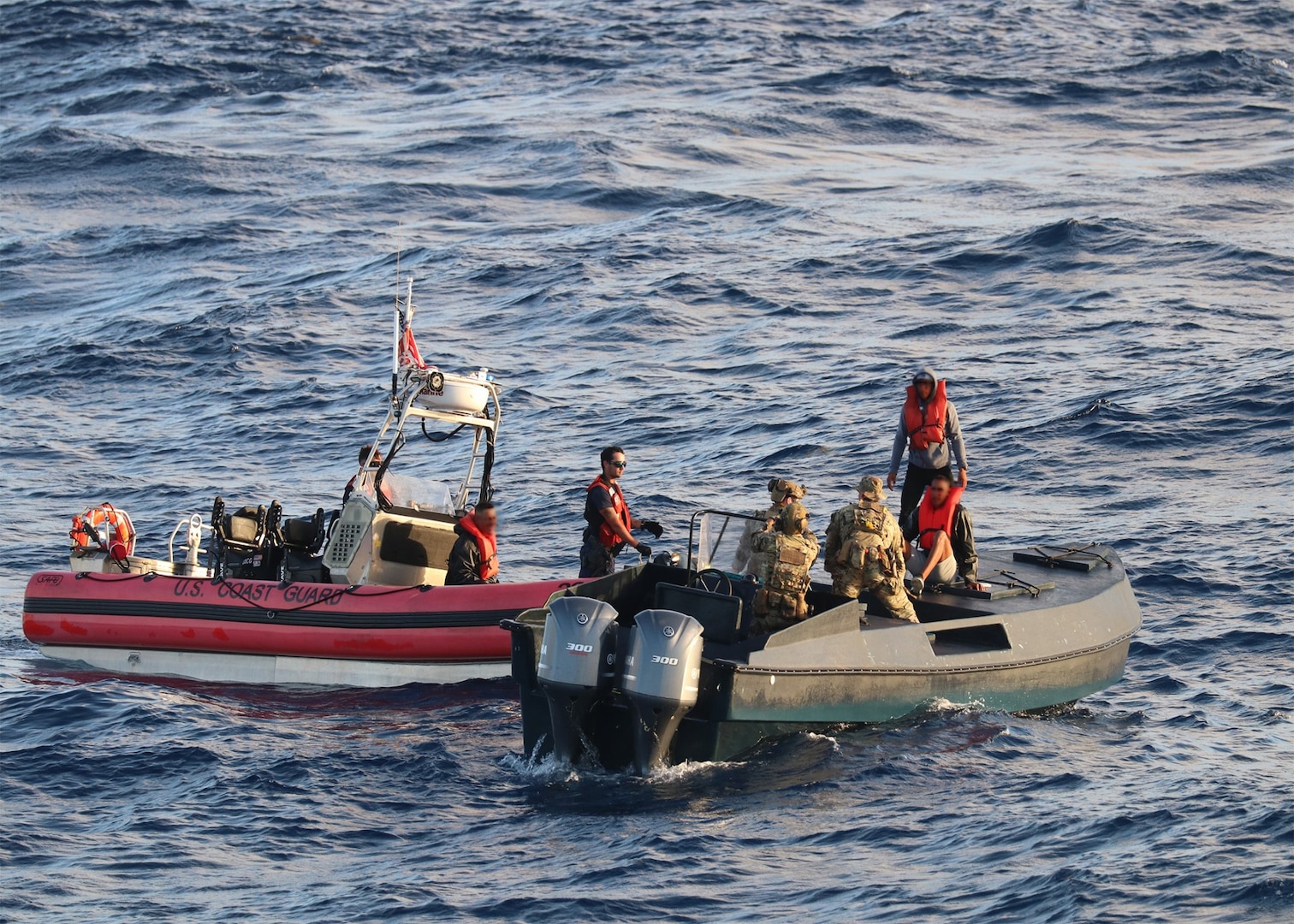 A Coast Guard PAcific Tactical Law Enforcment Team sailing aboard Coast Guard Cutter Bear (WMEC 901) interdicts a suspected drug smuggling venture in the Caribbean Sea, June 3, 2023.