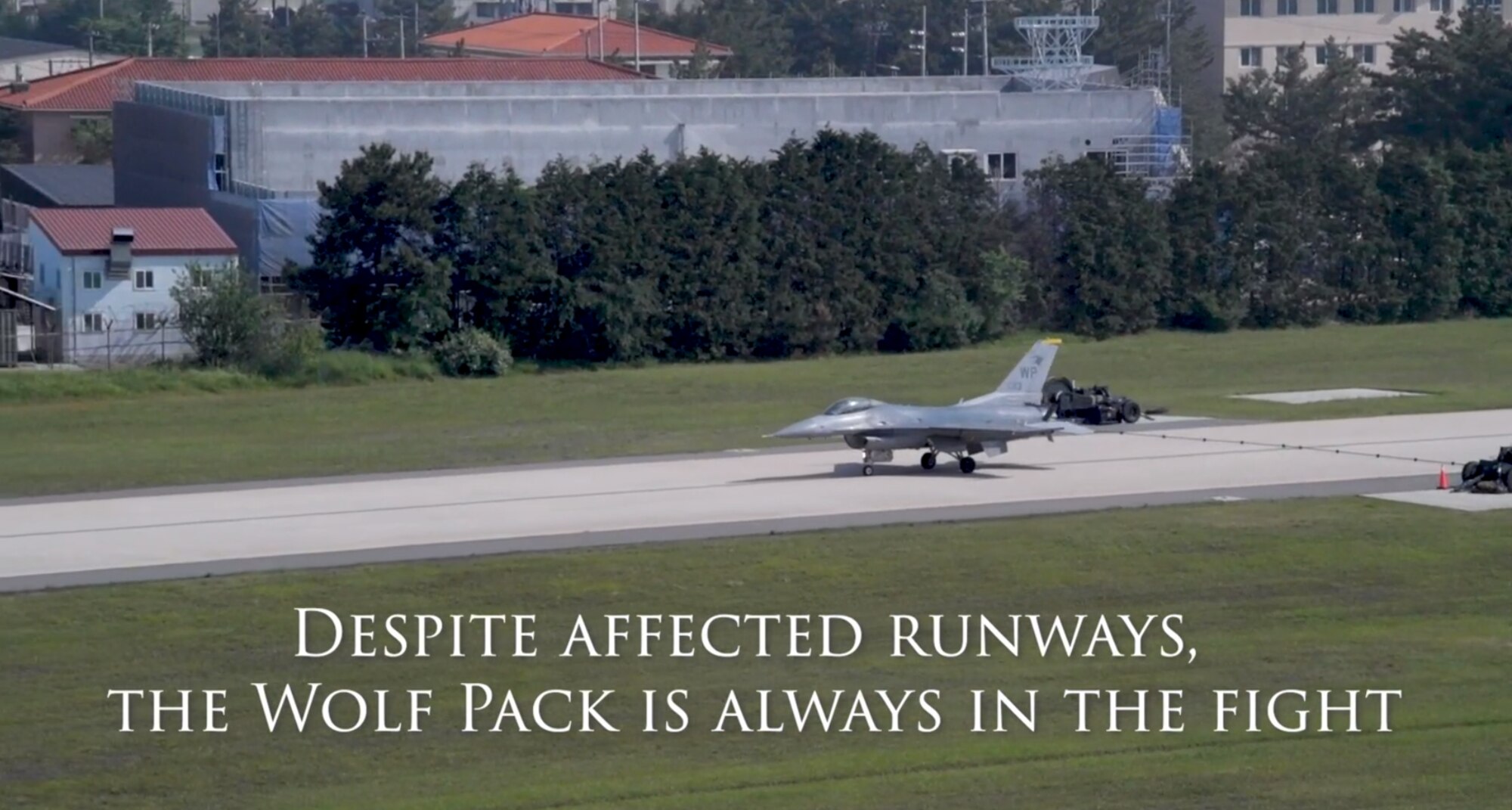 An F-16 Fighting Falcon taxis on a runway at Kunsan Air Base
