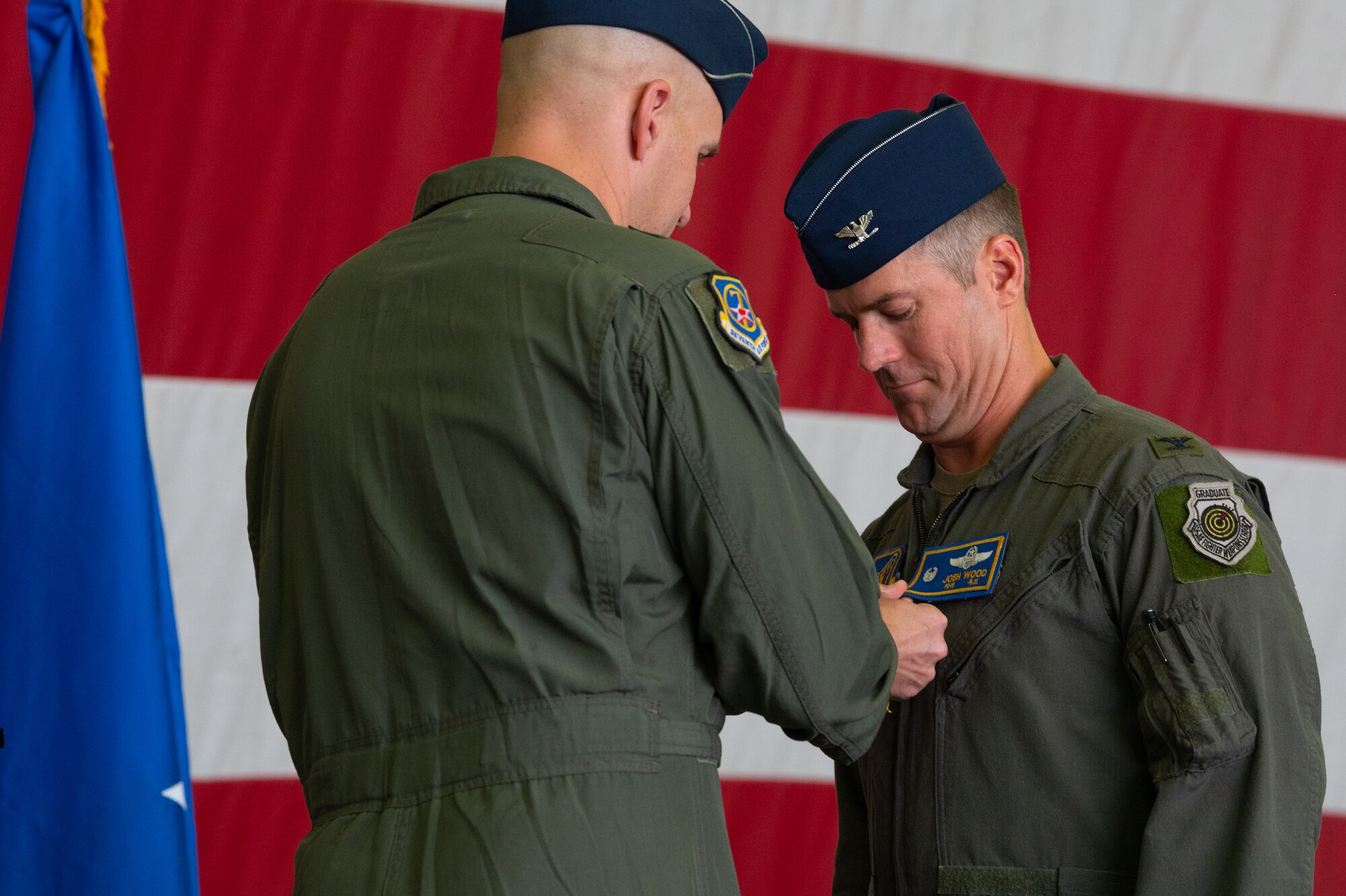 Photos of various leadership, Airmen at a wing-level change of command ceremony