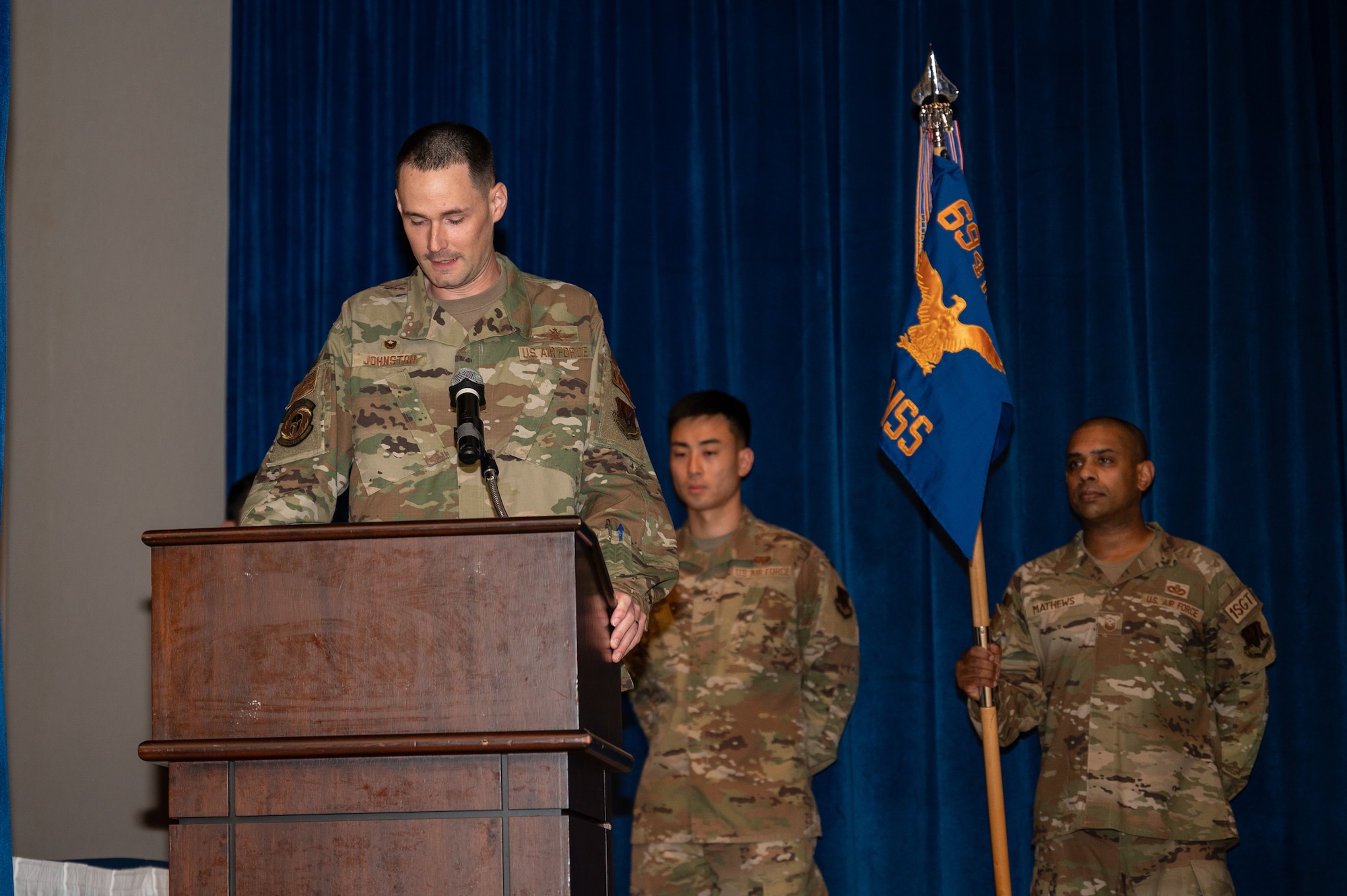 U.S. Air Force Maj. Daniel Johnston, 694th Intelligence Support Squadron incoming commander, provides his first speech to his squadron during a change of command ceremony at Osan Air Base, Republic of Korea, June 15, 2023. During the symbolic change of command ceremony, Johnston assumed control of the 694th ISS. (U.S. Air Force photo by Senior Airman Thomas Sjoberg)