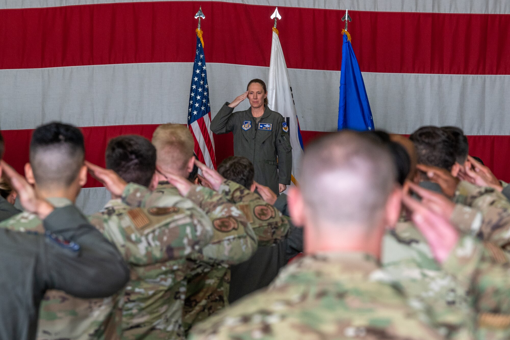 Photos of various Airmen and leadership at a change of command ceremony