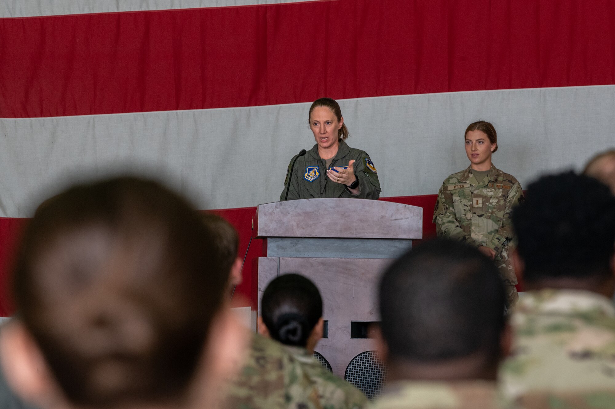 Photos of various Airmen and leadership at a change of command ceremony