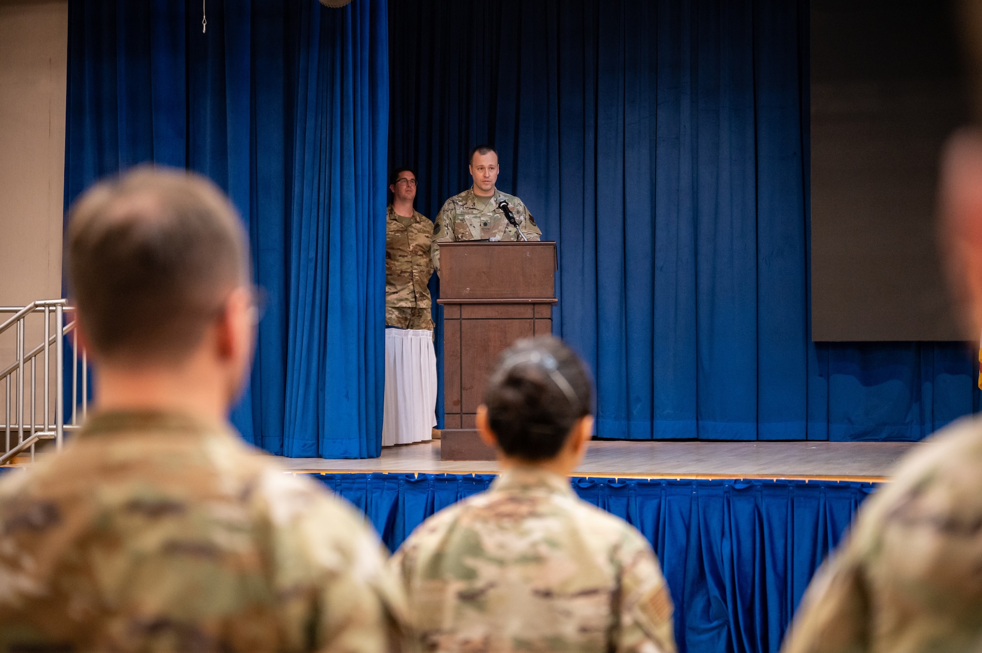 U.S. Air Force Lt. Col. Adam Fossum, 6th Intelligence Squadron incoming commander, provides his first speech to his squadron during the 6th IS change of command ceremony at Osan Air Base, Republic of Korea, June 14, 2023. Fossum took command of the 694th ISS during the symbolic change of command ceremony. (U.S. Air Force photo by Senior Airman Thomas Sjoberg)