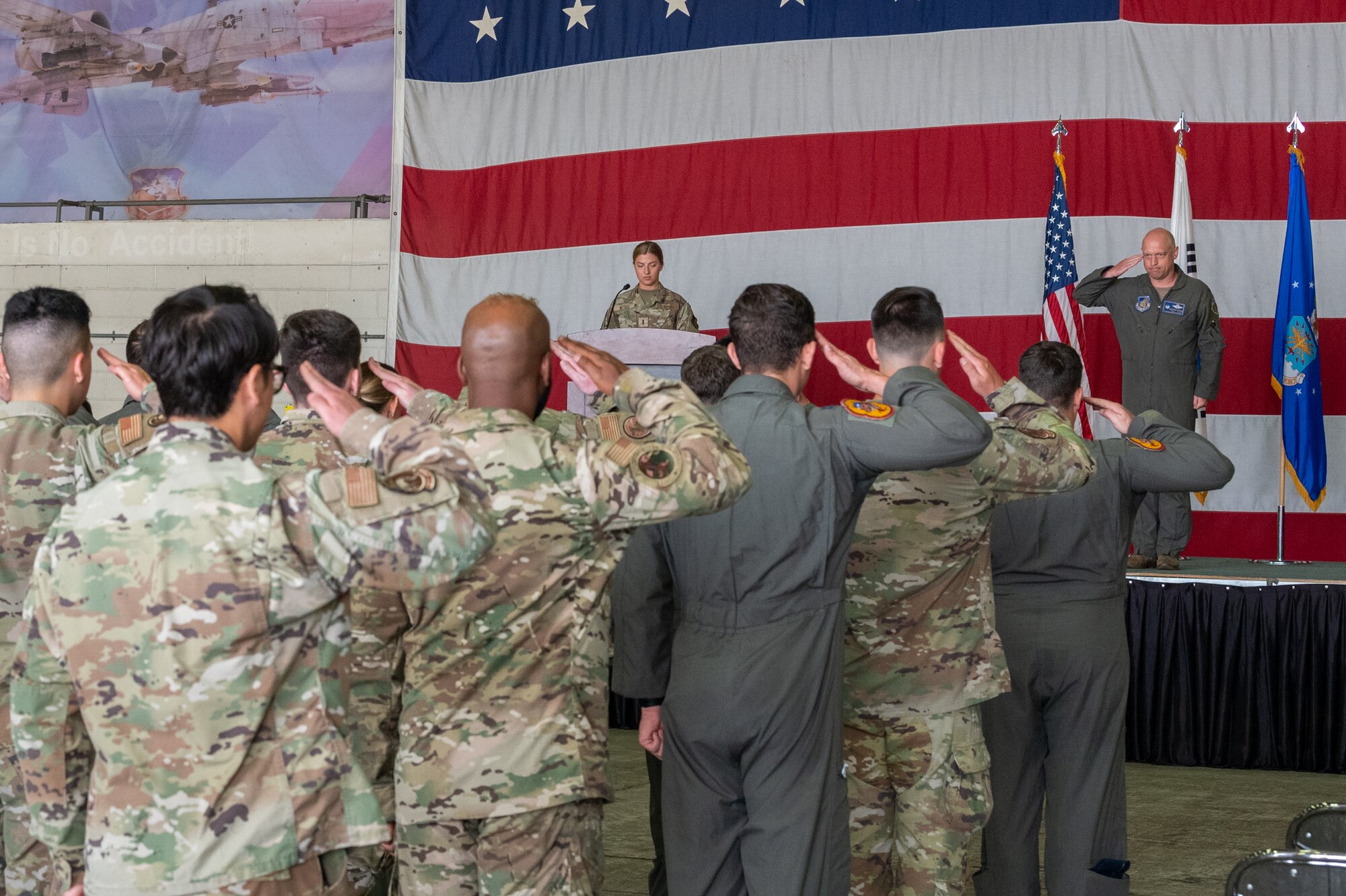 Photos of various Airmen and leadership at a change of command ceremony