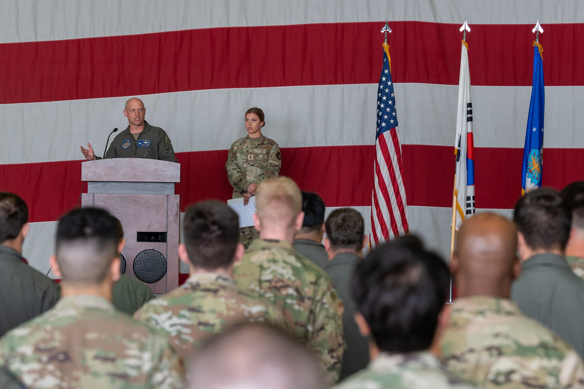 Photos of various Airmen and leadership at a change of command ceremony