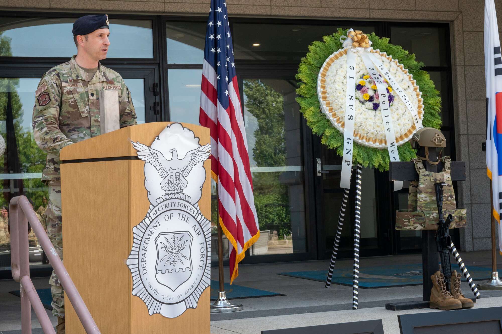U.S. Air Force Lt. Col. Nicholas Brence, 51st Security Forces Squadron commander, provides remarks during the 2023 Police Week closing ceremony, May 19, 2023. National Police Week offers honor, remembrance and peer support, while allowing law enforcement, survivors and citizens to gather and pay homage to those who gave their lives in the line of duty. (U.S. Air Force photo by Airman 1st Class Aaron Edwards)