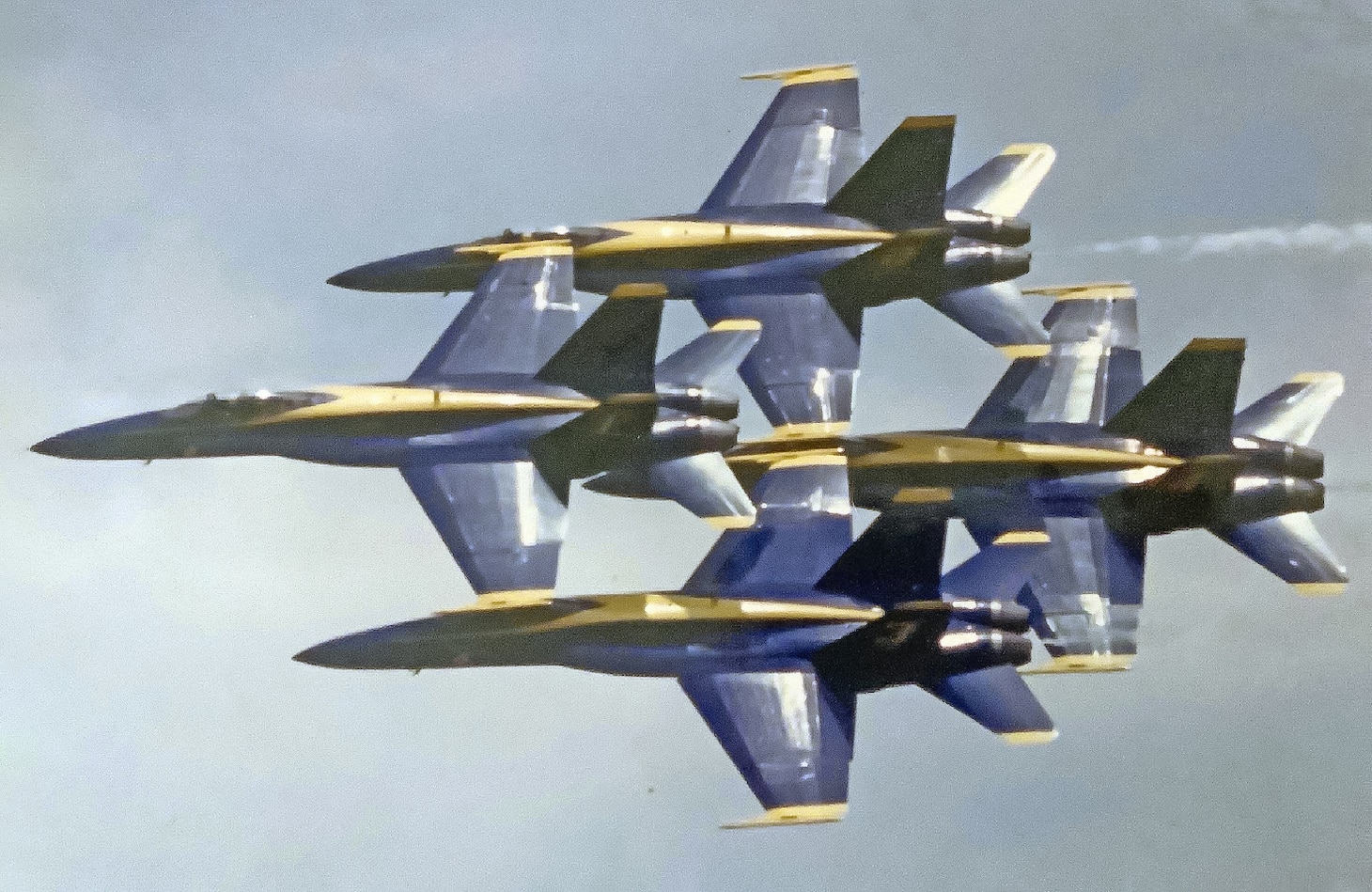 No photo probably describes the pilot skill and attending danger than this view of the Blue Angels’ signature four-plane Diamond 360, when the team’s four formation pilots are flying overlapped with just 36 inches of separation between aircraft. The No. 3 aircraft’s canopy is only 18 inches from the Boss’s left wing tip.