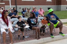 family and friends wait for Soldiers returning from a deployment