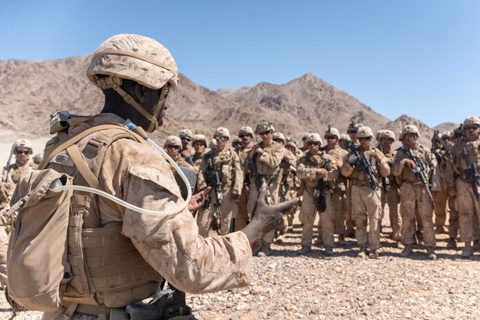 U.S. Marine Corps 2nd Lt. Nkundimana Claude, a fire team leader assigned to Alpha Company, 1st Battalion, 23rd Marine Regiment, 4th Marine Division, is pinned as a 2nd Lt. during his commissioning ceremony at the Marine Corps Air-Ground Combat Center Twentynine Palms, California, June 17, 2023. Claude moved to the United States from Democratic Republic of Congo, Africa and enlisted in the Marine Corps to become a U.S. citizen. He then graduated from Texas State University and commissioned as an officer.