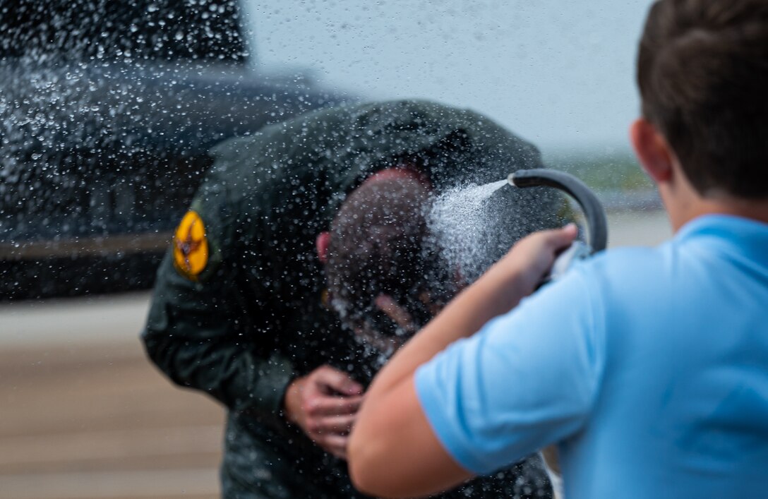 Col. Creeden completes his fini flight with his family, friends, and fellow commanders.