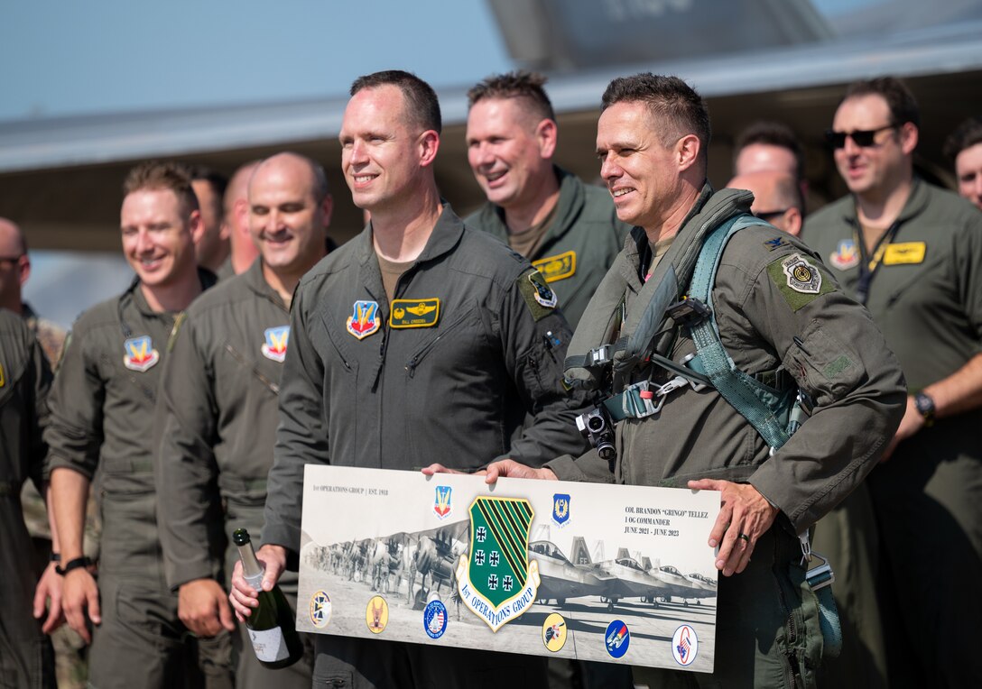 Col. Creeden completes his fini flight with his family, friends, and fellow commanders.