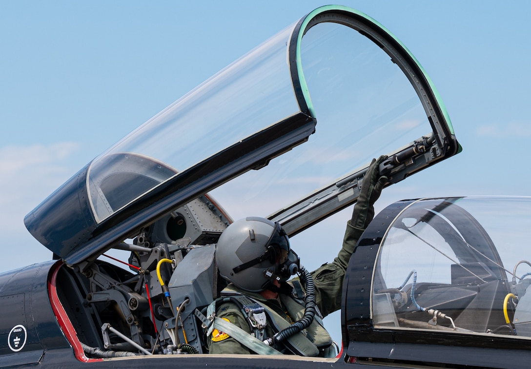 Col. Creeden completes his fini flight with his family, friends, and fellow commanders.