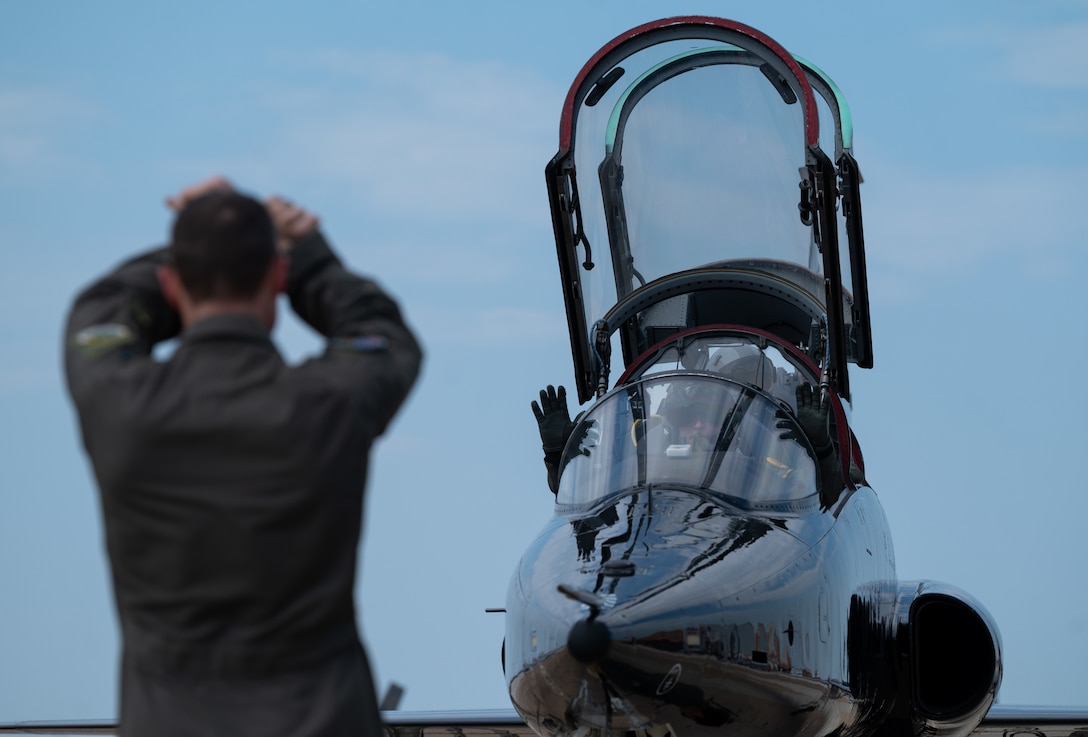 Col. Creeden completes his fini flight with his family, friends, and fellow commanders.