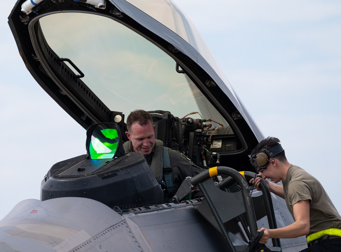 Col. Creeden completes his fini flight with his family, friends, and fellow commanders.