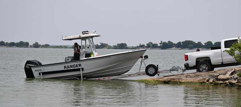 Park Ranger in boat preparing to launch in Lewisville Lake.