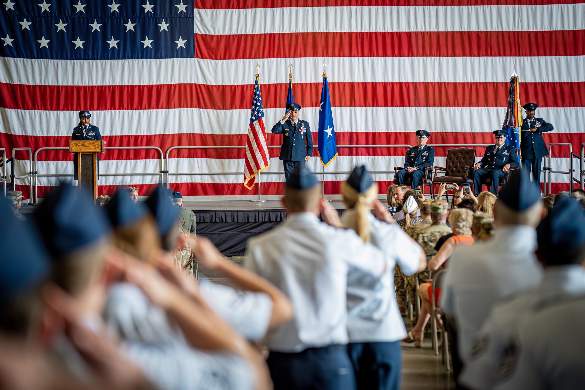 Col. Jason Vattioni renders his final salute to members of Team Kirtland.