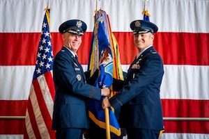 A guidon is passed to incoming commander.
