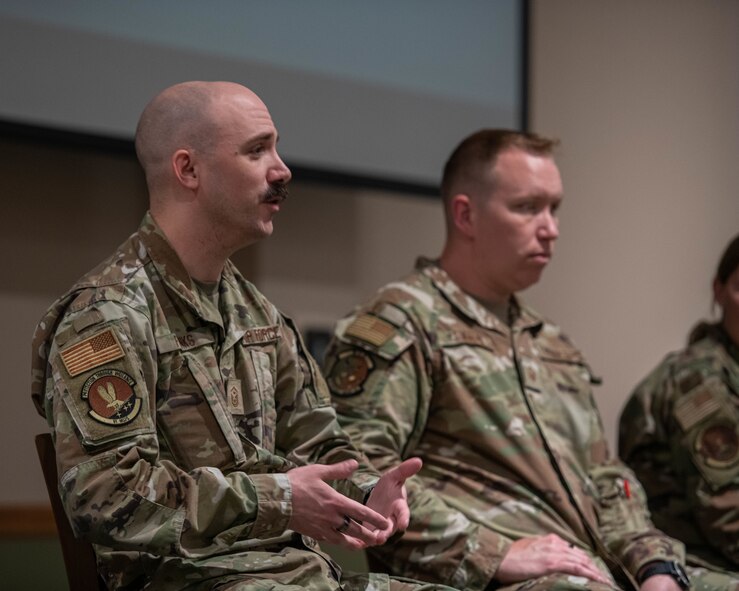 Chief Master Sgt. Ernest Crider, 91st Missile Wing command chief, delivers a speech at the First Sergeant Symposium at Minot Air Force Base, North Dakota, June 13, 2023. Crider emphasized the importance of emotional intelligence to effectively perform as a first sergeant. (U.S. Air Force photo by Airman 1st Class Kyle Wilson)