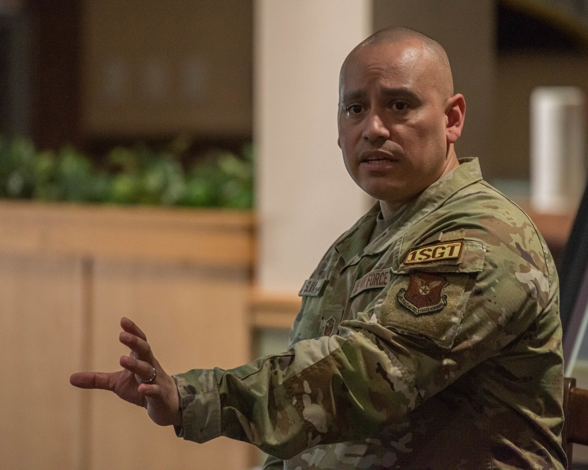 Chief Master Sgt. Ernest Crider, 91st Missile Wing command chief, delivers a speech at the First Sergeant Symposium at Minot Air Force Base, North Dakota, June 13, 2023. Crider emphasized the importance of emotional intelligence to effectively perform as a first sergeant. (U.S. Air Force photo by Airman 1st Class Kyle Wilson)