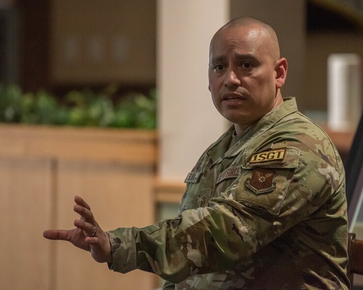 Chief Master Sgt. Ernest Crider, 91st Missile Wing command chief, delivers a speech at the First Sergeant Symposium at Minot Air Force Base, North Dakota, June 13, 2023. Crider emphasized the importance of emotional intelligence to effectively perform as a first sergeant. (U.S. Air Force photo by Airman 1st Class Kyle Wilson)