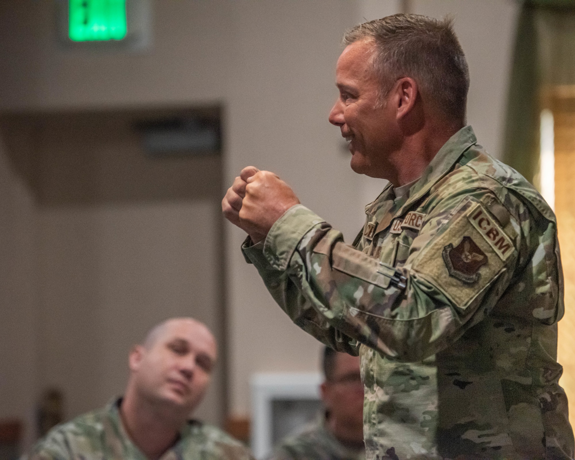 Chief Master Sgt. Ernest Crider, 91st Missile Wing command chief, delivers a speech at the First Sergeant Symposium at Minot Air Force Base, North Dakota, June 13, 2023. Crider emphasized the importance of emotional intelligence to effectively perform as a first sergeant. (U.S. Air Force photo by Airman 1st Class Kyle Wilson)