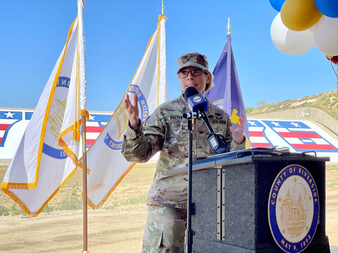 Col. Julie Balten, U.S. Army Corps of Engineers Los Angeles District commander, delivers remarks June 2 at Prado Dam in Corona, California, expressing her gratitude for the partnerships and hard work it took to restore the bicentennial mural.
