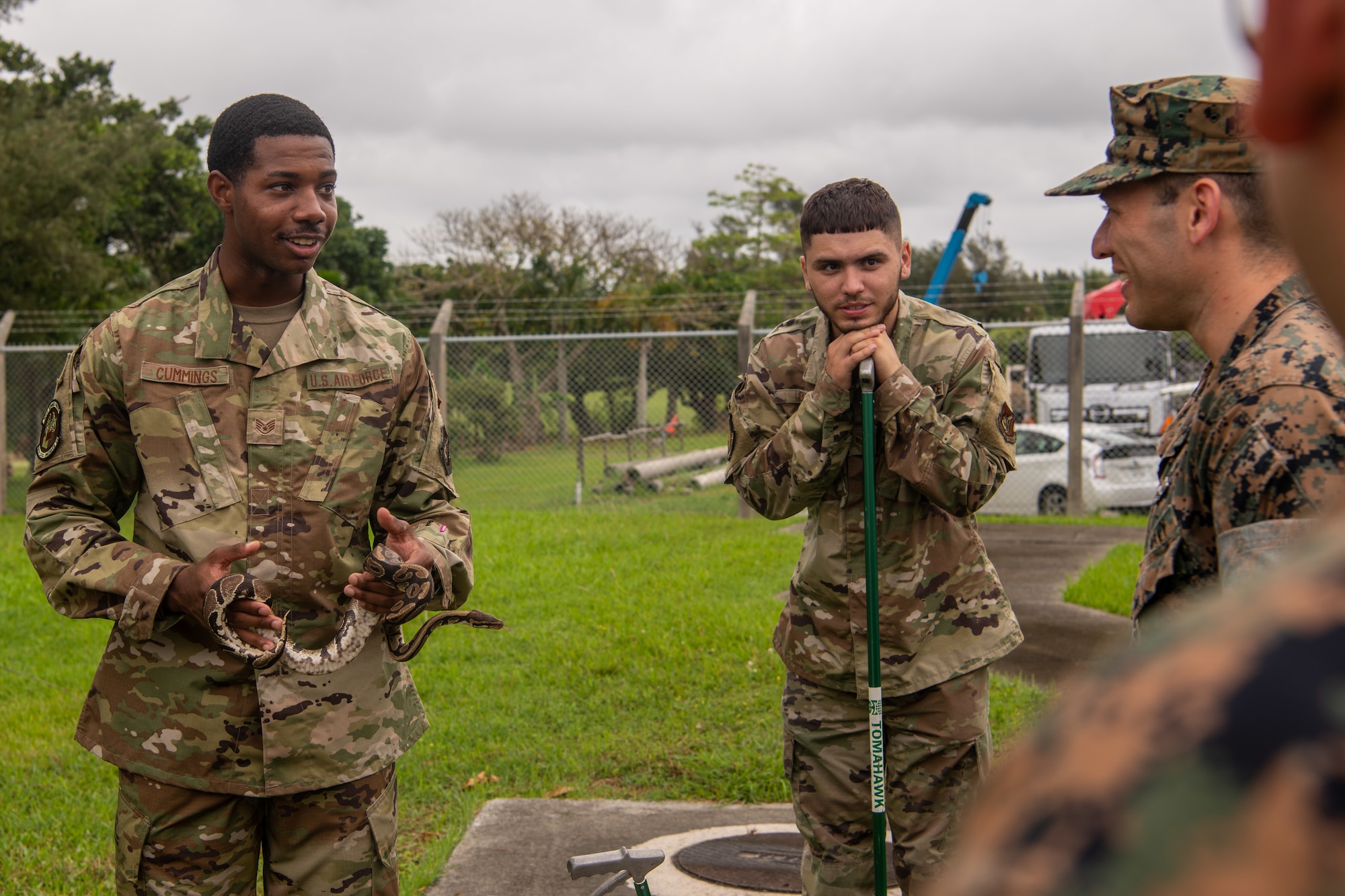 Airmen and Sailors talk about how to handle snakes.