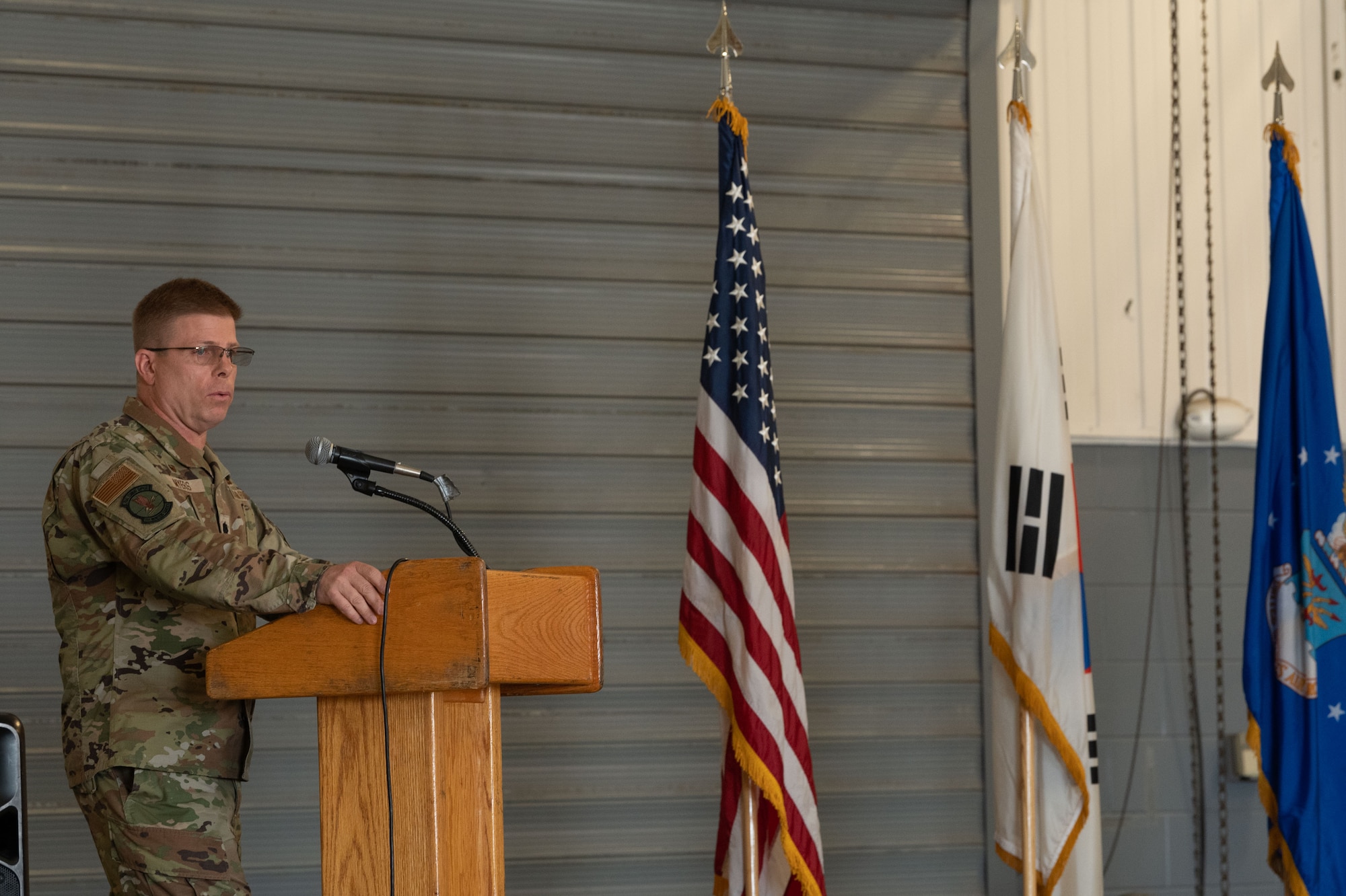 Photo of airmen and leadership at a change of command ceremony.