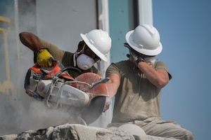 Photo of Airman working on construction site