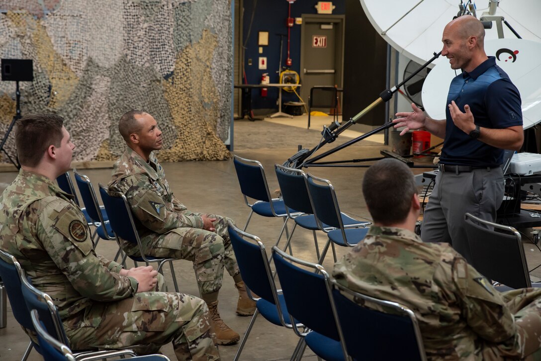 Guardians attend a Continuous Fitness Assessment, or CFA, study informational session hosted by an Air Force Research Laboratory team at a facility near Wright-Patterson Air Force Base, Ohio, June 8, 2023. The CFA study is a two-year voluntary effort with Guardians to assess the use of wearable fitness devices that measure physical activity. Guardians who pre-enrolled in the study received watches along with guidance on participation requirements. The CFA is part of the U.S. Space Force’s Holistic Health Approach, an initiative that promotes wellness through positive behaviors and seeks to replace traditional military fitness tests with data from continuous monitoring technology. (U.S. Space Force photo / Rick Eldridge).