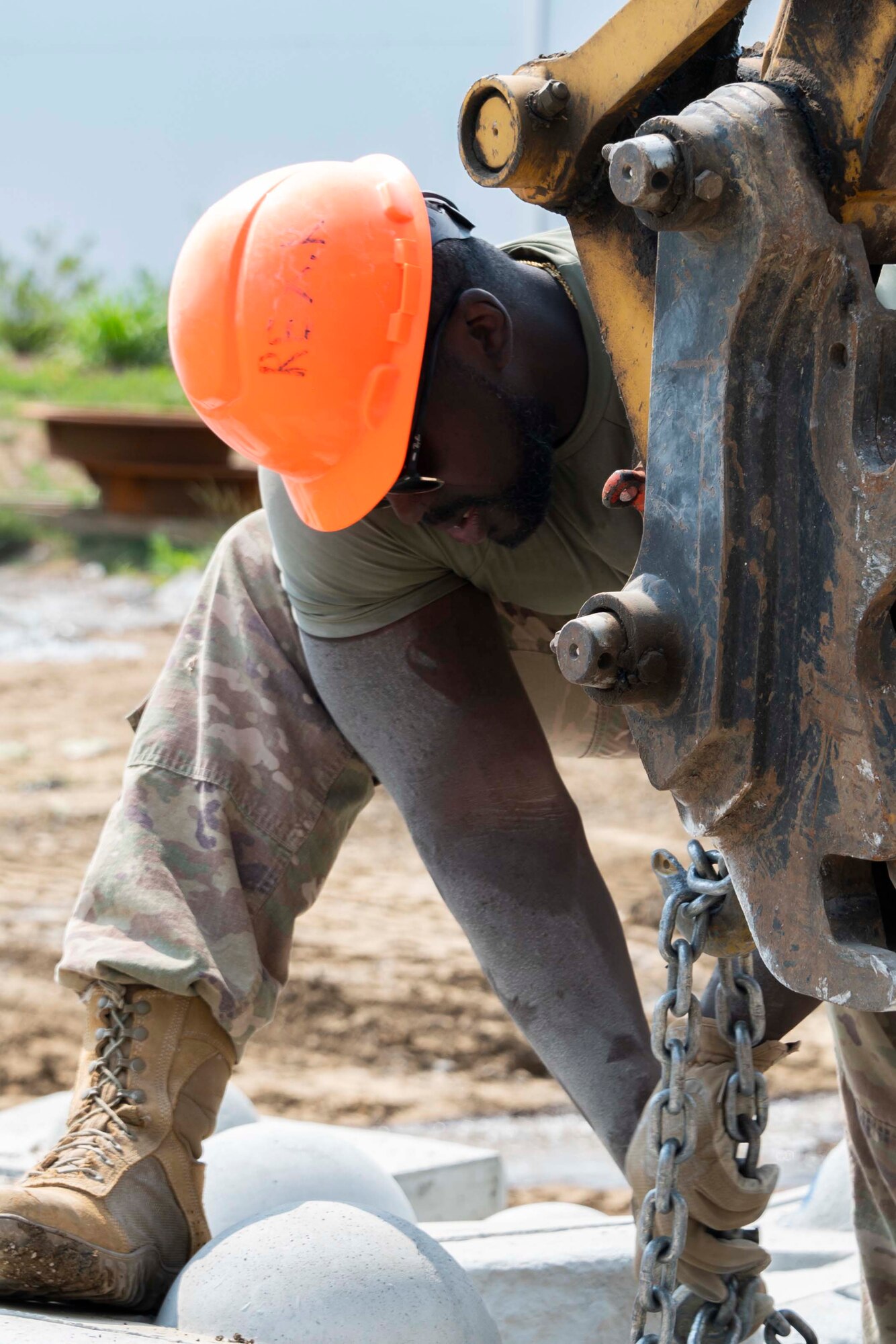 Photo of Airman working on construction site