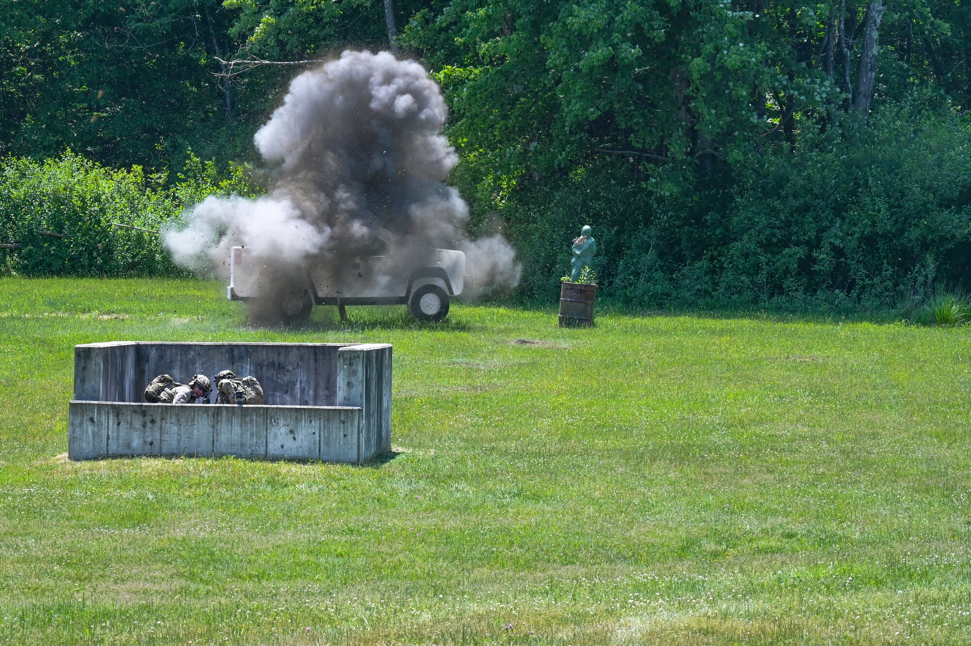 Tech. Sgt. Anthony McDaniel, an Integrated Defense Leadership Course cadre member assigned to the 914th Security Forces Squadron, Niagara Falls Air Reserve Station, New York, gives a thumbs up during the detonation of a live grenade on May 31, 2023, at Camp James A. Garfield Joint Military Training Center, Ohio.