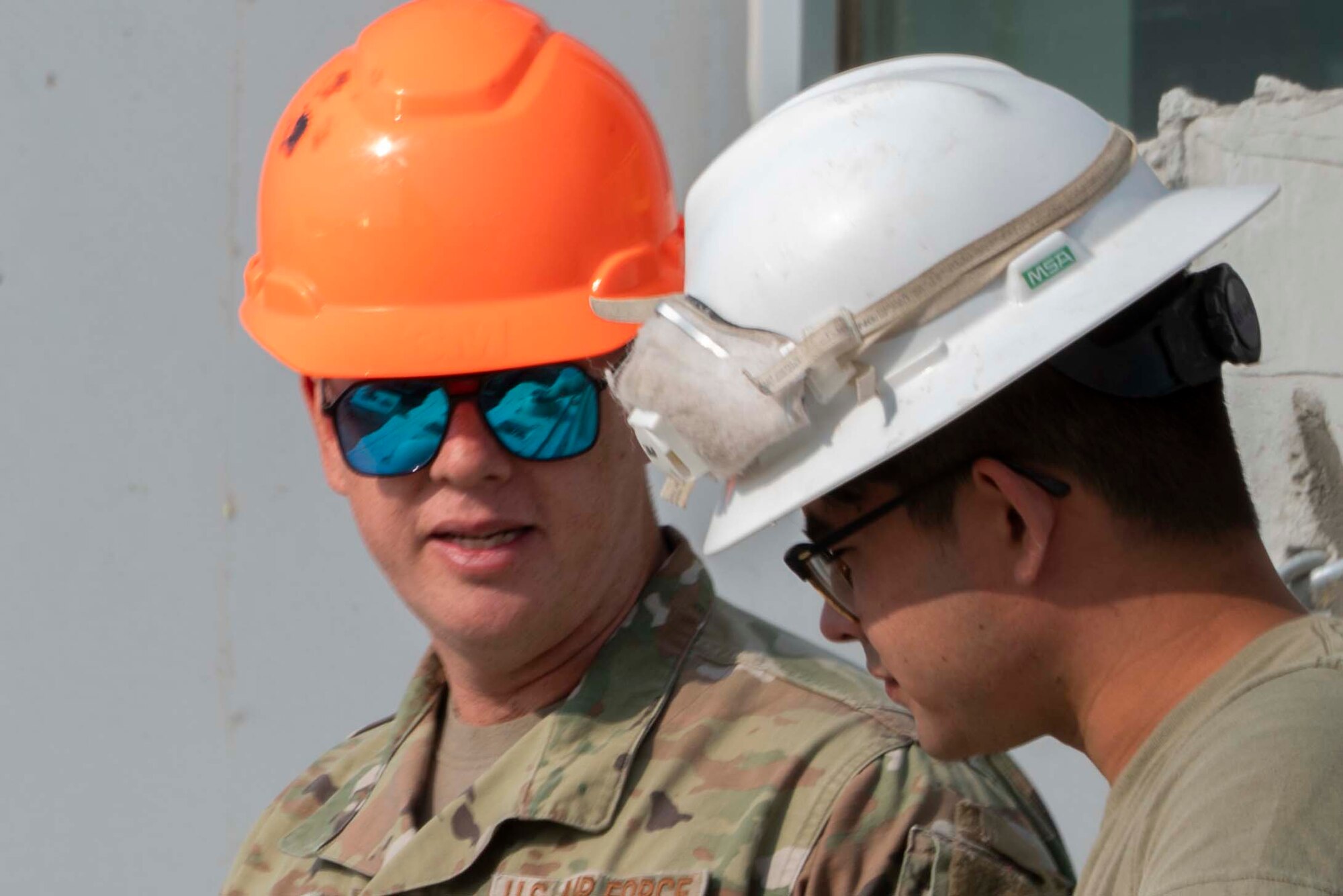 Photo of Airman working on construction site