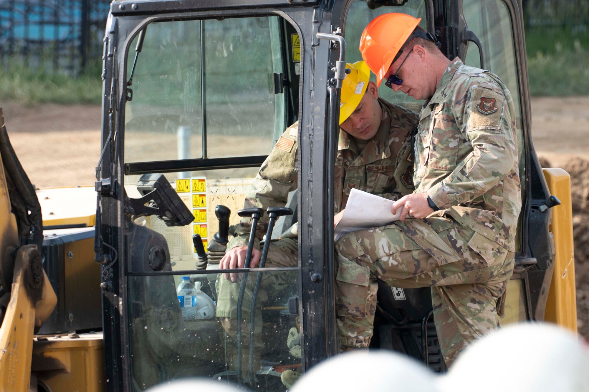 Photo of Airman working on construction site