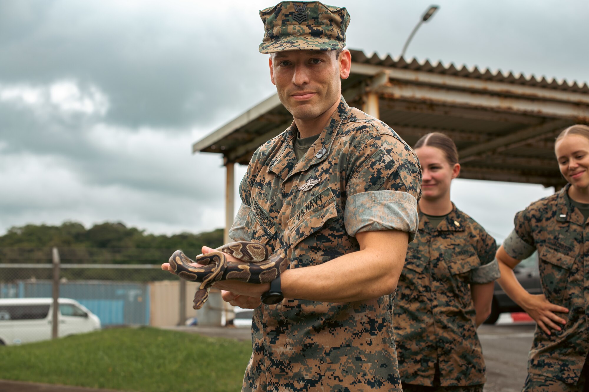 A Sailor poses for a photo.